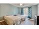Bedroom featuring two twin beds, hardwood floors and a ceiling fan at 105 Spring Creek Dr. # C, Myrtle Beach, SC 29588