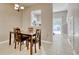 Cozy dining area with seating for four, visible kitchen, and tile flooring at 105 Spring Creek Dr. # C, Myrtle Beach, SC 29588