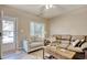 Comfortable living room with plush seating, area rug, and lots of natural light at 105 Spring Creek Dr. # C, Myrtle Beach, SC 29588