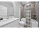 Bathroom featuring shower-tub combo, single sink, and a mirror at 1121 Oxeye St., North Myrtle Beach, SC 29582