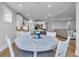 Open concept featuring dining area leading to kitchen and living room at 1121 Oxeye St., North Myrtle Beach, SC 29582