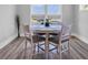 Cozy dining nook featuring a round table and large windows with natural light at 1121 Oxeye St., North Myrtle Beach, SC 29582