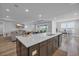 Open concept kitchen with island, connecting to living and dining areas at 1121 Oxeye St., North Myrtle Beach, SC 29582