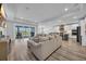 Expansive open-concept living space with large sliding doors, seamlessly integrating the living and kitchen areas at 1121 Oxeye St., North Myrtle Beach, SC 29582