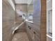 Walk-in shower with bench, rainfall shower head, and modern fixtures at 1121 Oxeye St., North Myrtle Beach, SC 29582