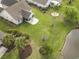 Aerial view showcasing the home's backyard, patio, and its proximity to the pond at 1133 Spalding Ct., Surfside Beach, SC 29575