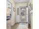 Inviting foyer featuring tile floors and a view of the bedroom and front door at 1133 Spalding Ct., Surfside Beach, SC 29575