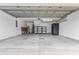 Spacious garage with painted walls, shelves, work bench and storage at 1133 Spalding Ct., Surfside Beach, SC 29575