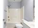 Neutral bathroom featuring a shower and tub combination with a white toilet and vanity at 118 Birch N Coppice Dr. # 2, Surfside Beach, SC 29575
