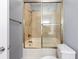 Well-maintained bathroom with a shower-tub combination and tile surround at 118 Birch N Coppice Dr. # 2, Surfside Beach, SC 29575
