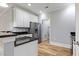 Modern kitchen featuring granite countertops, stainless steel appliances, and ample storage at 118 Birch N Coppice Dr. # 2, Surfside Beach, SC 29575