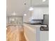 Open kitchen with granite countertops and stainless steel appliances at 118 Birch N Coppice Dr. # 2, Surfside Beach, SC 29575