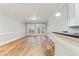 Living room with stylish lighting, wood floors, and neutral paint at 118 Birch N Coppice Dr. # 2, Surfside Beach, SC 29575