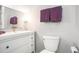 Clean, well-lit bathroom with a white vanity, toilet, and a modern mirror and fixtures, with fresh towels at 1205 Erin Way # 5C, Myrtle Beach, SC 29577