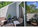 Private outdoor patio with comfortable wicker furniture, perfect for relaxation and enjoying the fresh air at 1205 Erin Way # 5C, Myrtle Beach, SC 29577