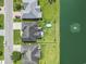 The aerial view highlights the home's backyard, pond access, pool, patio, and overall neighborhood layout at 131 River Country Dr., Conway, SC 29526