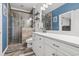 Spa bathroom featuring luxurious tiled walk-in shower, white vanity, and modern fixtures at 131 River Country Dr., Conway, SC 29526