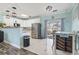 Bright kitchen with stainless steel appliances, ample white cabinetry, and a view of the outdoor patio at 131 River Country Dr., Conway, SC 29526