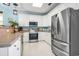 Modern kitchen featuring stainless steel appliances, bright white cabinets, and stylish countertops at 131 River Country Dr., Conway, SC 29526