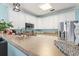 Open kitchen with stainless steel refrigerator, lots of countertop space, and white cabinets at 131 River Country Dr., Conway, SC 29526