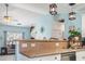 Kitchen features stainless steel appliances and countertops with views into living area at 131 River Country Dr., Conway, SC 29526