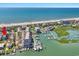 This aerial view showcases the home's location between the ocean and a marina, highlighting its prime location at 1473 Basin Trail, Murrells Inlet, SC 29576