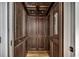 The elevator showcases paneled wood, recessed lighting, and simple controls, combining functionality and style at 1473 Basin Trail, Murrells Inlet, SC 29576