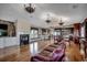 Spacious living area boasting hardwood floors, a cozy fireplace, and seamless access to the gourmet kitchen at 1473 Basin Trail, Murrells Inlet, SC 29576