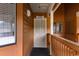 View of the unit entrance door with a 'Welcome' sign and a secure screen door at 180 Rothbury Circle # 305, Myrtle Beach, SC 29572
