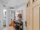 Inviting foyer with light walls, decor, and entry to the laundry and bathroom at 180 Rothbury Circle # 305, Myrtle Beach, SC 29572