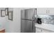 Bright kitchen featuring stainless steel appliances, white countertops, and white cabinets at 180 Rothbury Circle # 305, Myrtle Beach, SC 29572