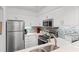Contemporary kitchen with stainless steel appliances and white countertops and cabinets at 180 Rothbury Circle # 305, Myrtle Beach, SC 29572