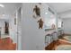 Inviting interior showcases updated kitchen with bar seating and a seamless transition to the adjacent living spaces at 180 Rothbury Circle # 305, Myrtle Beach, SC 29572