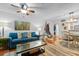 Bright living room with comfortable seating, stylish decor, and seamless transition to the dining and kitchen areas at 180 Rothbury Circle # 305, Myrtle Beach, SC 29572