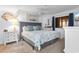 Serene primary bedroom features a comfortable bed, soft lighting, and tasteful decor for a relaxing retreat at 180 Rothbury Circle # 305, Myrtle Beach, SC 29572
