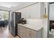 Well-lit kitchen featuring granite countertops, stainless steel appliances, and ample cabinet space at 183 Glenwood Dr., Conway, SC 29526