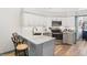 Stylish kitchen with stainless steel appliances, granite countertops, and a breakfast bar at 183 Glenwood Dr., Conway, SC 29526