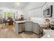 Bright kitchen with stainless steel appliances, granite countertops, and breakfast bar at 183 Glenwood Dr., Conway, SC 29526