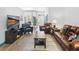 Inviting living room with a TV and leather seating, perfect for relaxation and entertainment at 183 Glenwood Dr., Conway, SC 29526