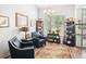 Charming sitting area with a window view, complete with stylish chairs and decor at 183 Glenwood Dr., Conway, SC 29526