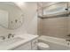 Bright bathroom with a single sink vanity, an oval mirror and a bathtub shower combo at 1844 Wood Stork Dr., Conway, SC 29526
