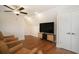 Upstairs Gathering room with a television, mounted speakers, and leather seating at 1844 Wood Stork Dr., Conway, SC 29526