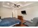 Spacious main bedroom with tray ceilings, a ceiling fan, and hardwood floors at 1844 Wood Stork Dr., Conway, SC 29526