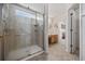 Bathroom with a glass enclosed shower, vanity, and vinyl flooring at 195 Black Pepper Loop, Little River, SC 29566