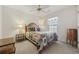 Cozy bedroom with cabin-themed quilt and decor offers a comfortable and inviting space at 195 Black Pepper Loop, Little River, SC 29566