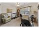 Versatile spare bedroom with a treadmill and desk for exercise or work from home at 195 Black Pepper Loop, Little River, SC 29566