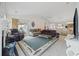 Spacious living room featuring a fireplace, ceiling fan, and access to a sliding door at 195 Black Pepper Loop, Little River, SC 29566