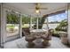 Charming screened-in patio with comfortable seating, perfect for relaxing outdoors at 195 Black Pepper Loop, Little River, SC 29566