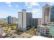 Stunning aerial view of the building and surrounding area with a blue sky overhead at 2001 S Ocean Blvd. # 1405, Myrtle Beach, SC 29577