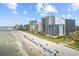 Extensive aerial view of a beach, high-rise buildings and the ocean at 2001 S Ocean Blvd. # 1405, Myrtle Beach, SC 29577